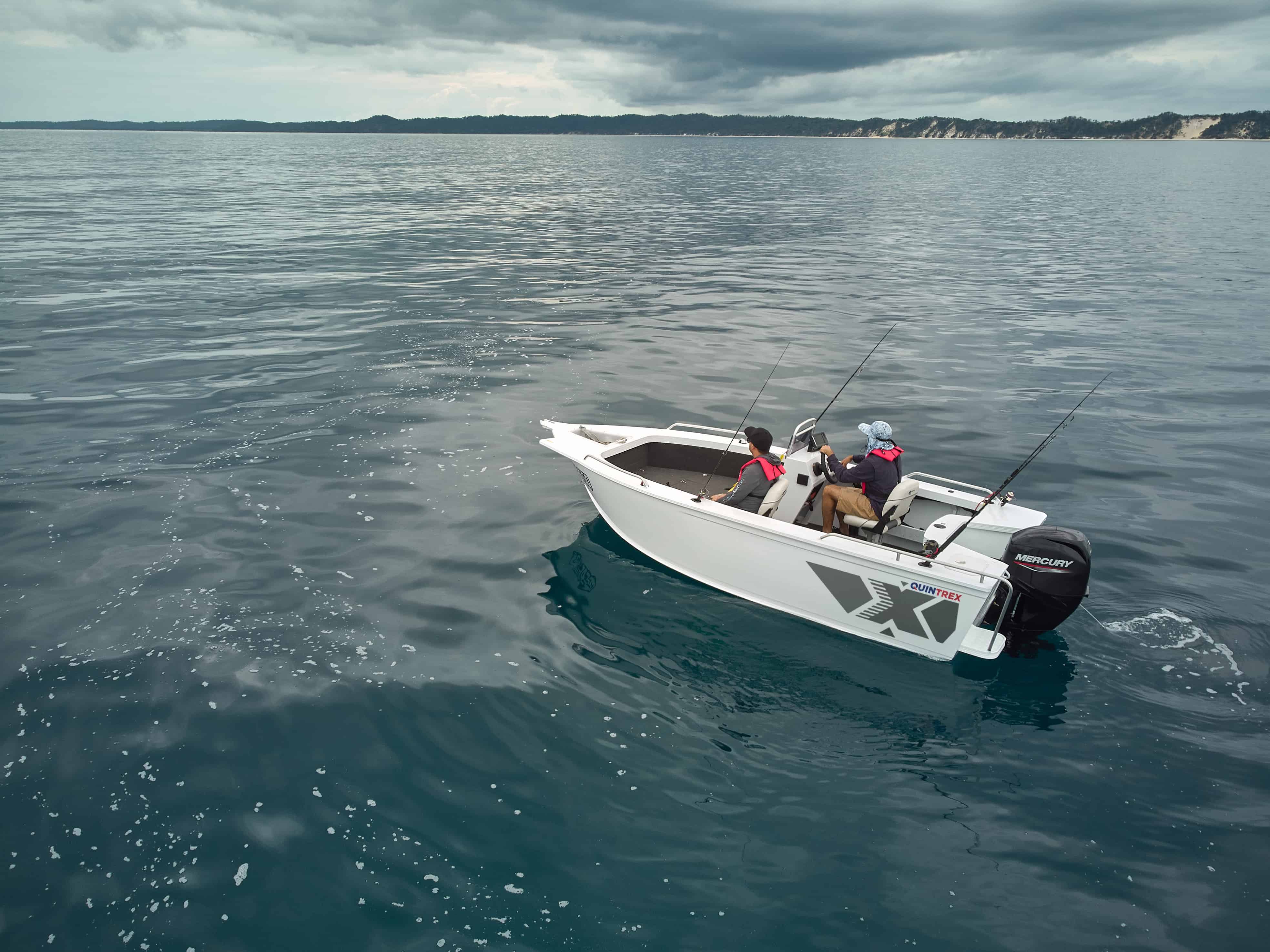 Quintrex fishing boat aluminium gliding through choppy waters